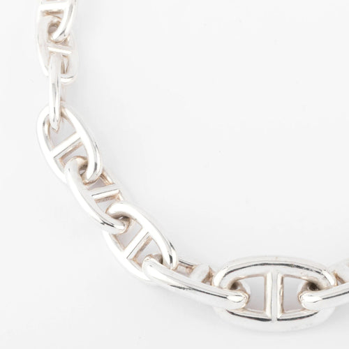 Collier Collier en argent de la maison Hermès 58 Facettes