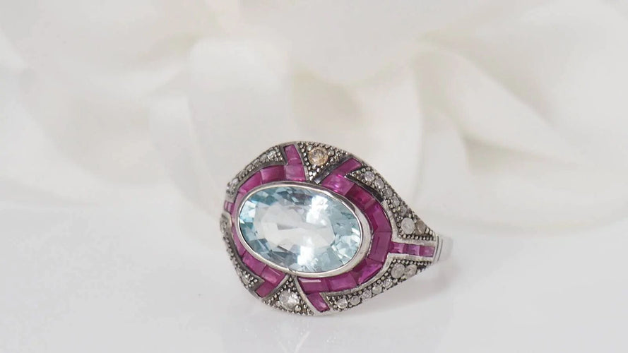 Bague Bague Art Déco or blanc et argent, aigue marine, rubis et diamants 58 Facettes 31442