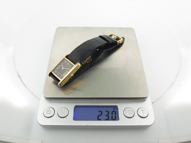 Montre vintage montre CARTIER tank pm 27 mm mecanique en or jaune 18k 58 Facettes 253144