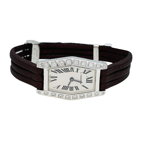Montre Montre Cartier "Lanière" en or blanc et diamants, bracelet cuir. 58 Facettes 30252