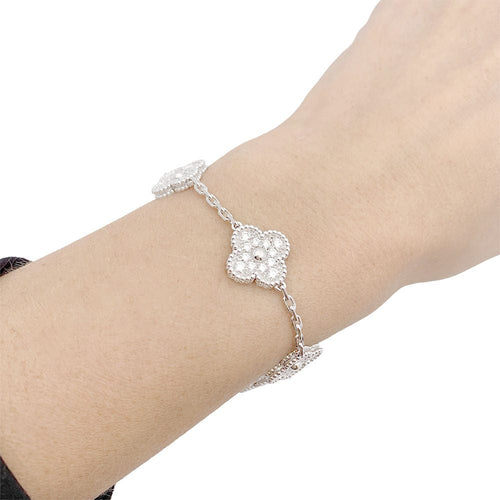 Bracelet Bracelet Van Cleef & Arpels, "Vintage Alhambra", or blanc, diamants. 58 Facettes 33552