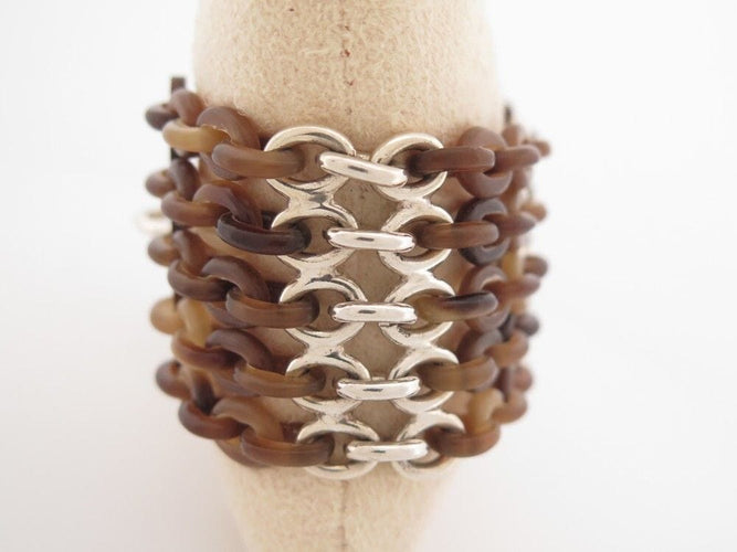 Bracelet bracelet HERMES manchette maillons 18 cm argent 925 et corne de buffle 58 Facettes 257682