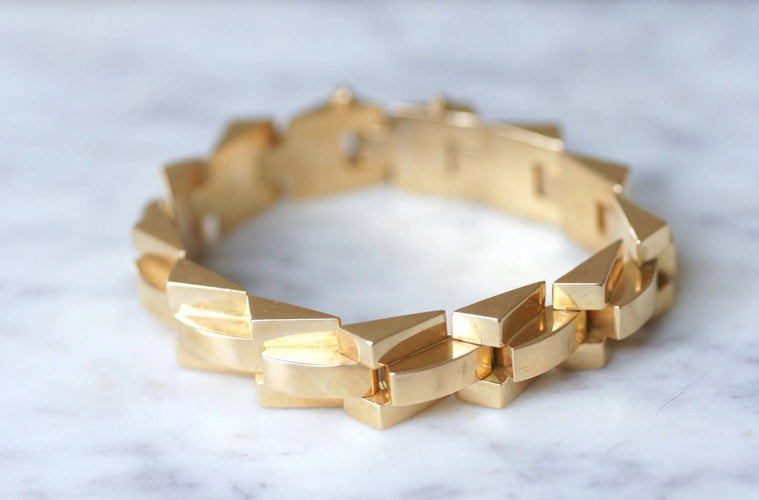 Bracelet Bracelet tank articulé en or jaune 58 Facettes