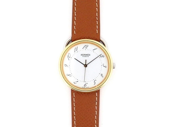 Montre montre HERMES arceau quartz 33 mm or & acier 58 Facettes 254345