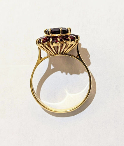 Bague Bague Marguerite or et grenats 58 Facettes