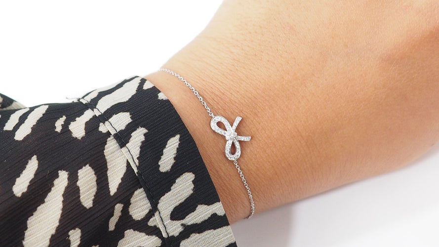 Bracelet Tiffany & Co - Bracelet Noeud  en platine et diamants 58 Facettes 32159