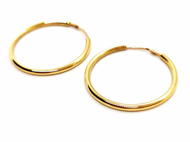 Boucles d'oreilles Boucles d'oreilles Créoles Or jaune 58 Facettes 1732456CN