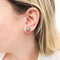 Boucles d'oreilles Puces Pomellato, "Nudo", deux ors, diamants bruns. 58 Facettes 33225