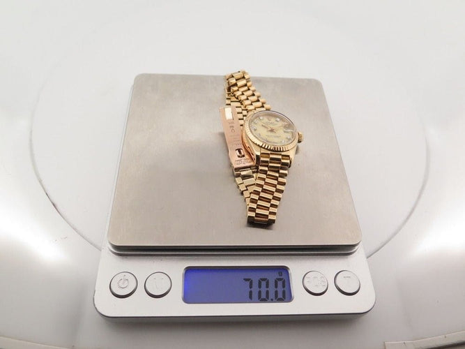 Montre montre ROLEX oyster perpetual lady datejust 26m or jaune 18k diamant 58 Facettes 254467