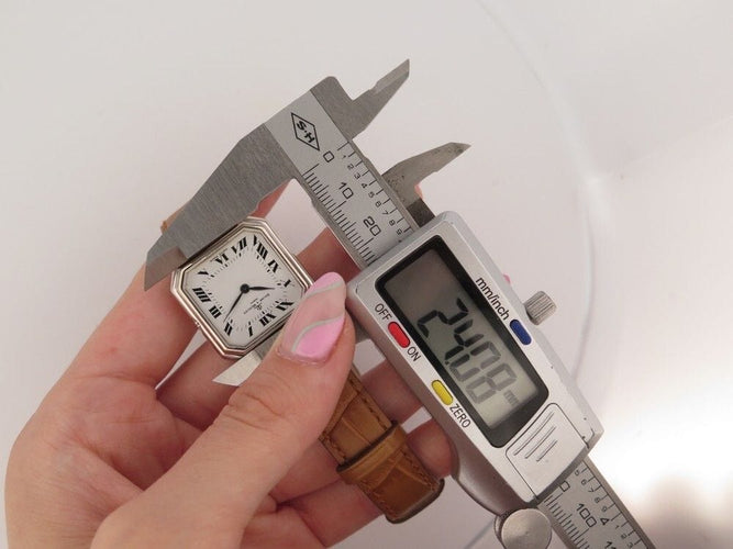 Montre vintage montre BAUME ET MERCIER lady 38260 27 mm quartz or blanc 18k 58 Facettes 252218