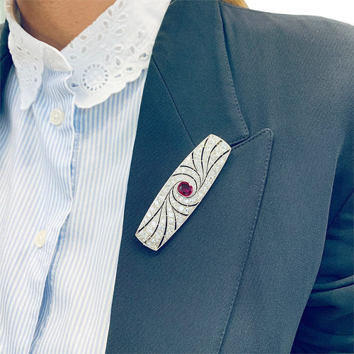 Broche Broche Art Déco en platine, rubis et diamants. 58 Facettes 31864