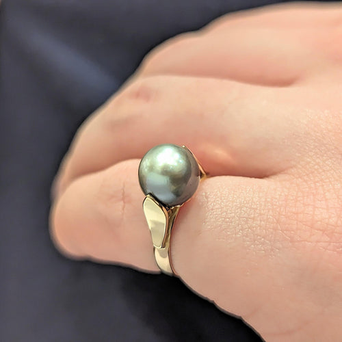 Bague Bague en or rose et perle grise 58 Facettes 25040