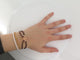 Bracelet bracelet LOUIS VUITTON coeur fleur monogram or rose 18k sur cordon 58 Facettes 249782