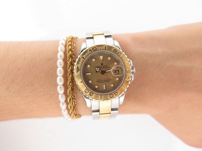 Montre vintage montre ROLEX yacht master lady 29 mm or & acier auto 58 Facettes 254447