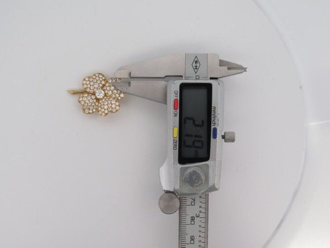 Broche vintage broche VAN CLEEF & ARPELS cosmos or jaune 18k diamants 3.65ct 58 Facettes 250924