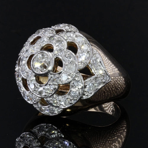 Bague 48 Bague boule ajourée d'un décor de fleur et diamants 58 Facettes 21-620
