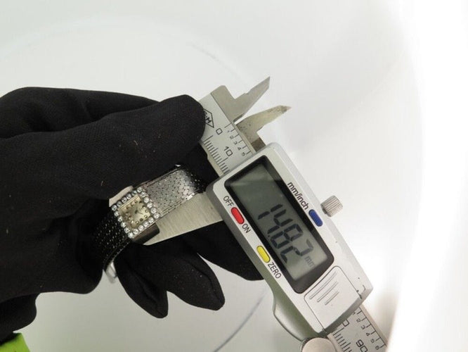 Montre vintage montre EBEL carre en or blanc 18k et diamants 0.4ct mecanique 58 Facettes 250142