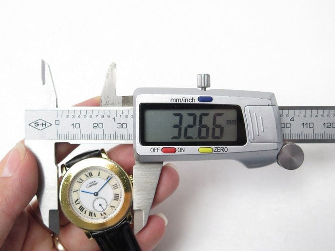 Montre vintage montre CARTIER 1810 must ronde 32 mm quartz plaque or et cuir 58 Facettes 254679