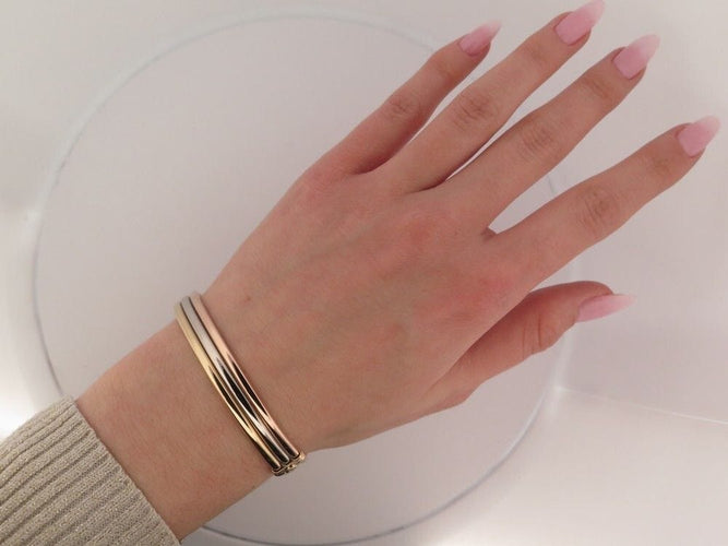 Bracelet vintage bracelet CARTIER trinity jonc rigide en 3 ors 18k t20 58 Facettes 250517