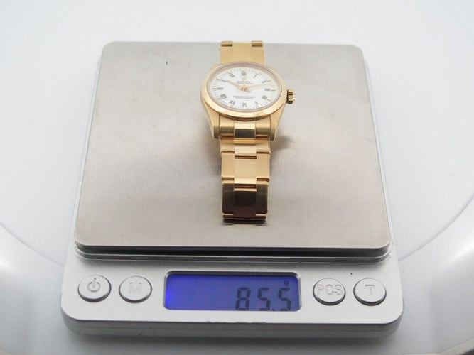 Montre vintage montre ROLEX oyster perpetual 67488 31 mm automatique or jaune 18k 58 Facettes 252911