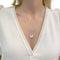 Collier Collier Cartier, "Amulette", or blanc, diamants. 58 Facettes 32992