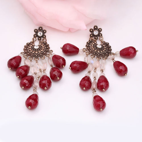 Boucles d'oreilles Boucles d'oreilles chandelier cristaux et rubis 58 Facettes 16-047