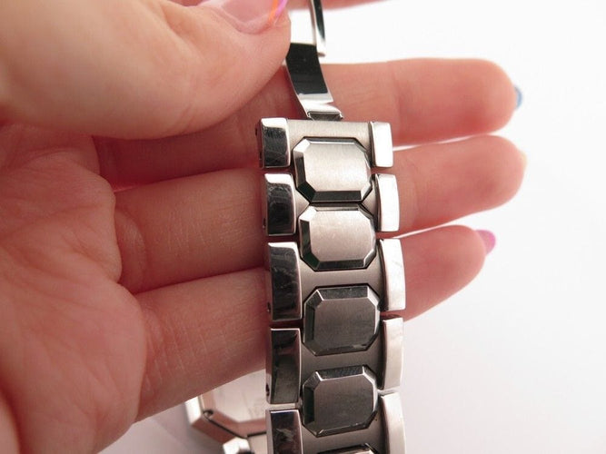 Montre montre REPOSSI r1sq 35 mm quartz classique en acier palladie 58 Facettes 250937