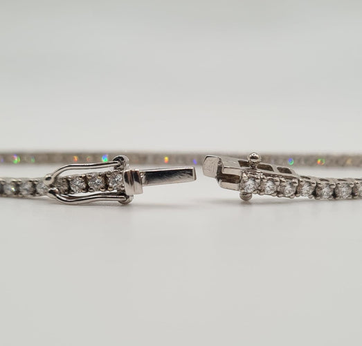 Bracelet Bracelet tennis or blanc 18 carats serti de diamants 58 Facettes