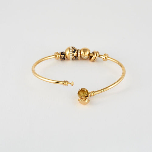 Bracelet Bracelet or jaune 18 k et ses charms 58 Facettes