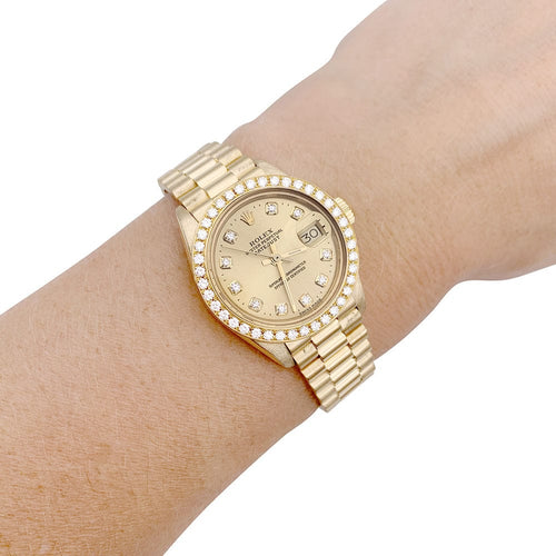 Montre Montre Rolex,"Oyster Pertpetual Datejust", or jaune, diamants. 58 Facettes 33072