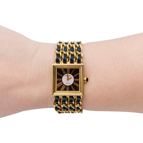 Montre Montre Chanel, "Mademoiselle", or jaune, cuir. 58 Facettes 32185