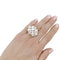 Bague 56 Bague Chanel, Baroque, or blanc, diamants, perles de culture. 58 Facettes 32342
