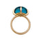 Bague 50 Bague Pomellato "Veleno" en or rose, topaze blue london. 58 Facettes 31402
