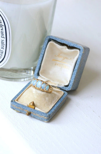 Bague Bague jarretière opales et diamants 58 Facettes