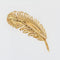Broche Broche plume d'or jaune 58 Facettes CVBR18A