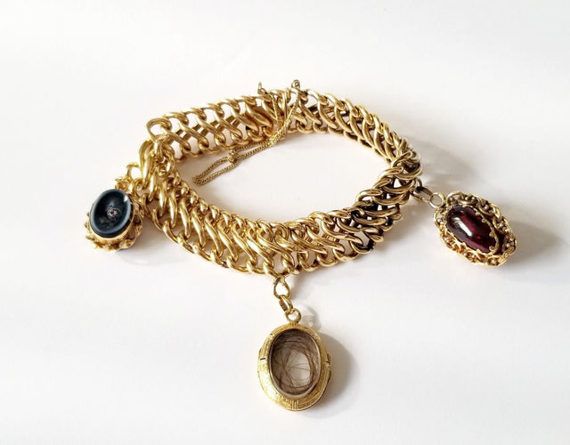 Bracelet Bracelet maille américaine or jaune et breloques 58 Facettes