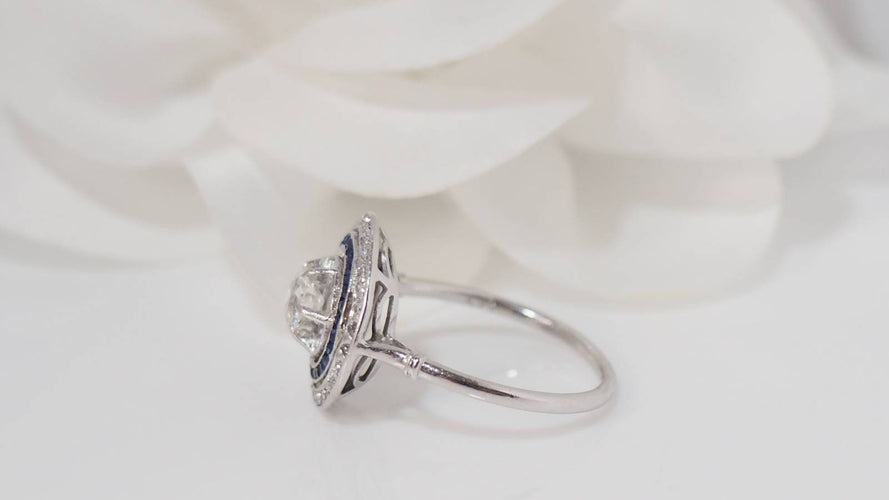 Bague Bague double entourage Art Déco platine, saphirs calibrés et diamants 58 Facettes