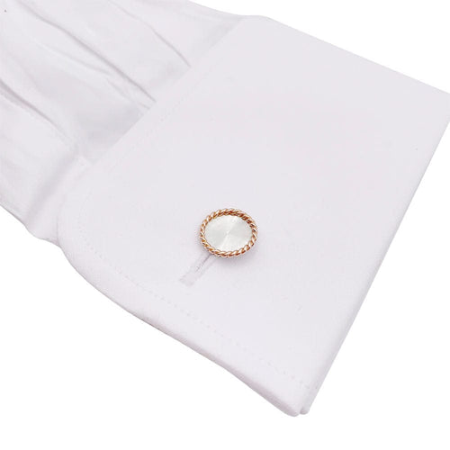 Boutons de manchette Boutons de manchette en deux tons d'or. 58 Facettes 32741