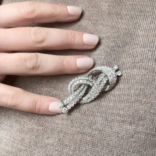 Clip Clip de revers Nœud Or blanc Platine Diamants 58 Facettes REF23108-130