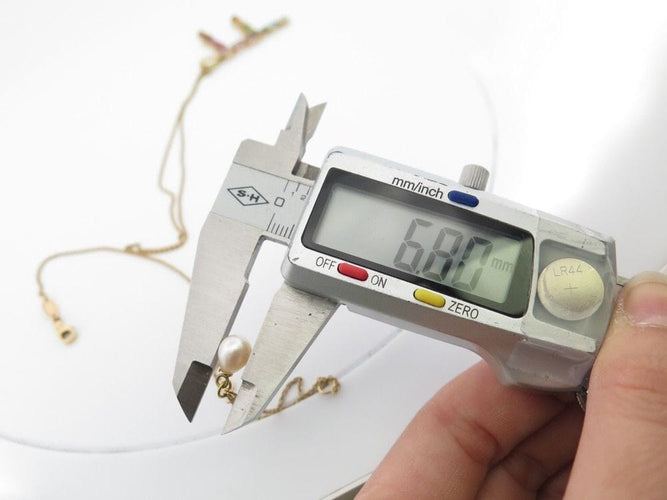 Collier collier pendentif DOLCE & GABBANA breloque f rainbow t50 or jaune 58 Facettes 250337