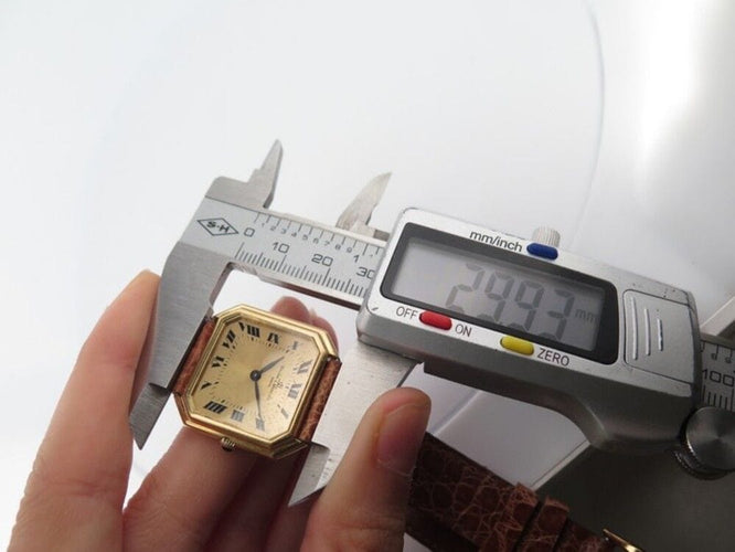 Montre vintage montre BAUME ET MERCIER 29 mm en or jaune 18k mecanique lady 58 Facettes 254182