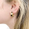 Boucles d'oreilles Boucles d'oreilles Boucheron, "Les Plurielles", en or jaune, diamants, bois d'amourette. 58 Facettes 32822