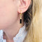 Boucles d'oreilles Créoles Chaumet, "Touch Wood", or jaune, bois. 58 Facettes 32796