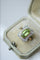 Bague Bague Belle Epoque Péridot entourage diamants 58 Facettes