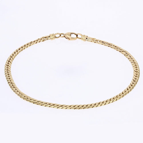 Bracelet Bracelet or jaune maille gourmette plate 58 Facettes CVBR34