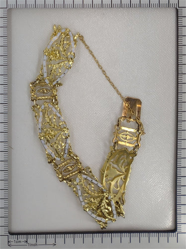 Bracelet Bracelet vintage or émail blanc attribué à Lucien Gautrait 58 Facettes 23086-0159