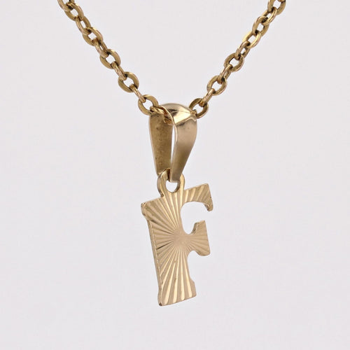 Pendentif Breloque or jaune lettre F 58 Facettes CVP98