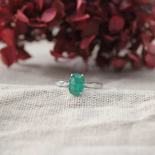 Bague Solitaire or blanc Emeraude ovale 58 Facettes