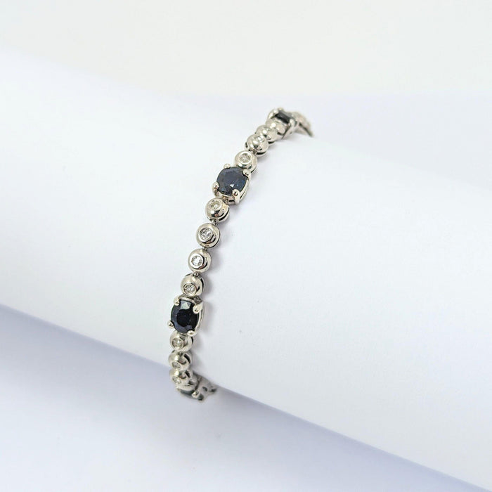 Bracelet Bracelet or blanc, diamants et saphirs 58 Facettes 25534