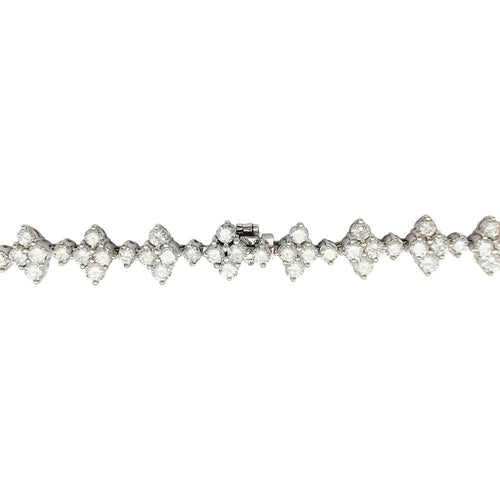 Collier Collier fleurettes en or blanc et diamants. 58 Facettes 31829